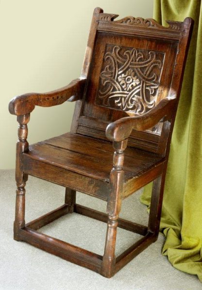 A Mid Century 17th Century Carved Oak Wainscot Chair