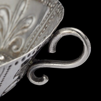 A Charles I silver Saucer Dish with scrolled handle