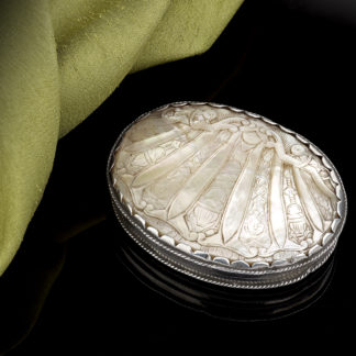 A little carved mother of pearl box with silver mounts, 17th Century Closed