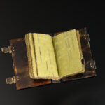 A rare and pretty little Charles II period pin/needle case in the form of a book, c.1660 open