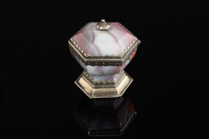 A rare hexagonal Salt made of rose coloured agate, with a hinged lid and silver mounts; German, 17th century main