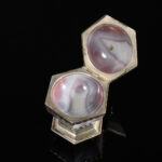 A rare hexagonal Salt made of rose coloured agate, with a hinged lid and silver mounts; German, 17th century open