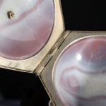 A rare hexagonal Salt made of rose coloured agate, with a hinged lid and silver mounts; German, 17th century hinge