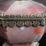 A rare hexagonal Salt made of rose coloured agate, with a hinged lid and silver mounts; German, 17th century detail