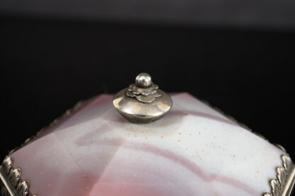 A rare hexagonal Salt made of rose coloured agate, with a hinged lid and silver mounts; German, 17th century top