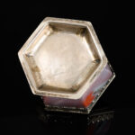 A rare hexagonal Salt made of rose coloured agate, with a hinged lid and silver mounts; German, 17th century bottom