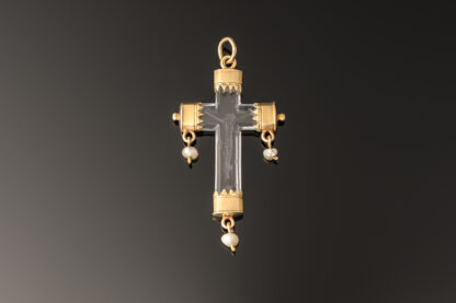 A rock crystal devotional pendant, consisting of a crucifix with gold mounts and small natural pearl drops; Italian, c.1550 main image