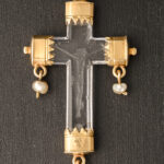 A rock crystal devotional pendant, consisting of a crucifix with gold mounts and small natural pearl drops; Italian, c.1550 close