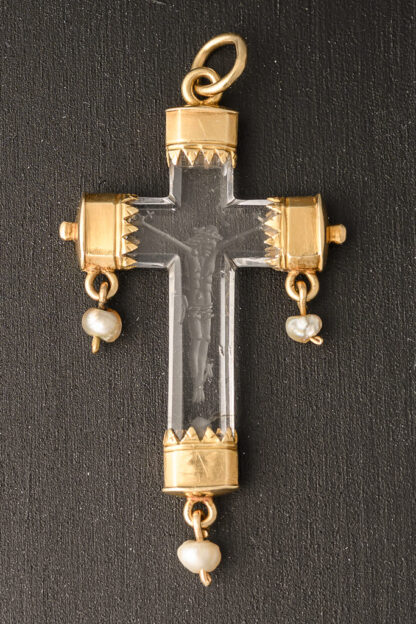 A rock crystal devotional pendant, consisting of a crucifix with gold mounts and small natural pearl drops; Italian, c.1550 close