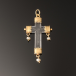 A rock crystal devotional pendant, consisting of a crucifix with gold mounts and small natural pearl drops; Italian, c.1550 square
