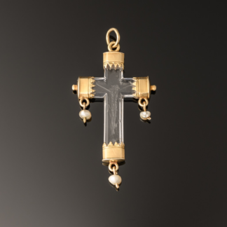 A rock crystal devotional pendant, consisting of a crucifix with gold mounts and small natural pearl drops; Italian, c.1550 square