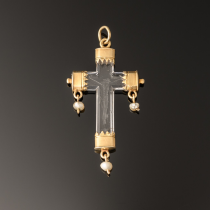A rock crystal devotional pendant, consisting of a crucifix with gold mounts and small natural pearl drops; Italian, c.1550 square