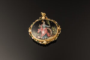 A devotional pendant, rock crystal mounted with gold decorated with enamels; Italian or Spanish, mid 17th century St Catherine side