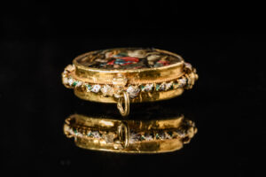 A devotional pendant, rock crystal mounted with gold decorated with enamels; Italian or Spanish, mid 17th century