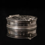 A rare silver travelling Pyx of circular form; English c.1685 back side