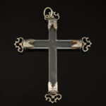 A fine rock crystal crucifix with silver mounts; Spanish, 17th century back